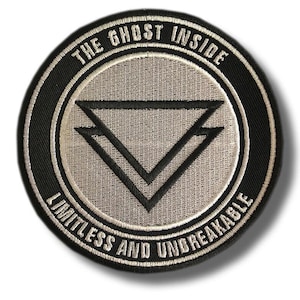 May include: Round black and white patch with the text "THE GHOST INSIDE" at the top and "LIMITLESS AND UNBREAKABLE" at the bottom. The center features a gray circle with a black inverted triangle design.
