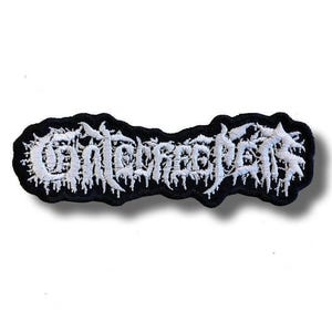 May include: Embroidered patch with the word "Contorted" in white, stylized, gothic lettering on a black background. The patch has a jagged, irregular shape and a white border.