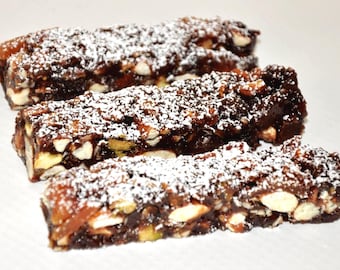 Caja de regalo de pastel navideño de frutas y nueces con especias italianas Panforte