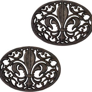 May include: A set of three ceramic mugs with a speckled, matte finish. The mugs are in shades of cream, light gray, and dark gray. Each mug has a simple, minimalist design, perfect for coffee or tea.