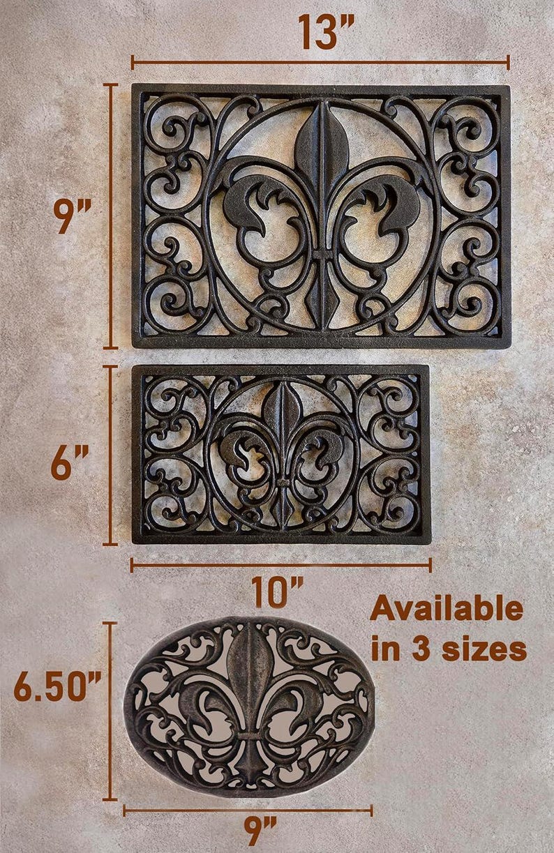 May include: Three decorative black metal door mats with a fleur-de-lis design. The largest is 13" x 9", the medium is 10" x 6", and the smallest is 9" x 6.50". The mats are available in 3 sizes.