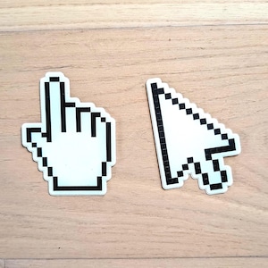 May include: A set of three ceramic mugs with a speckled, matte finish. The mugs are in shades of cream, light gray, and dark gray. Each mug has a simple, minimalist design, perfect for coffee or tea.