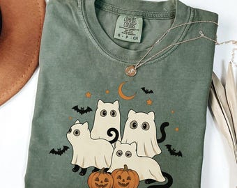 ハロウィン猫シャツ、ゴースト猫シャツ、黒猫シャツ、猫ママハロウィンTシャツ、不気味でかわいいシャツ、秋の猫好きへのギフト、カボチャ猫Tシャツ