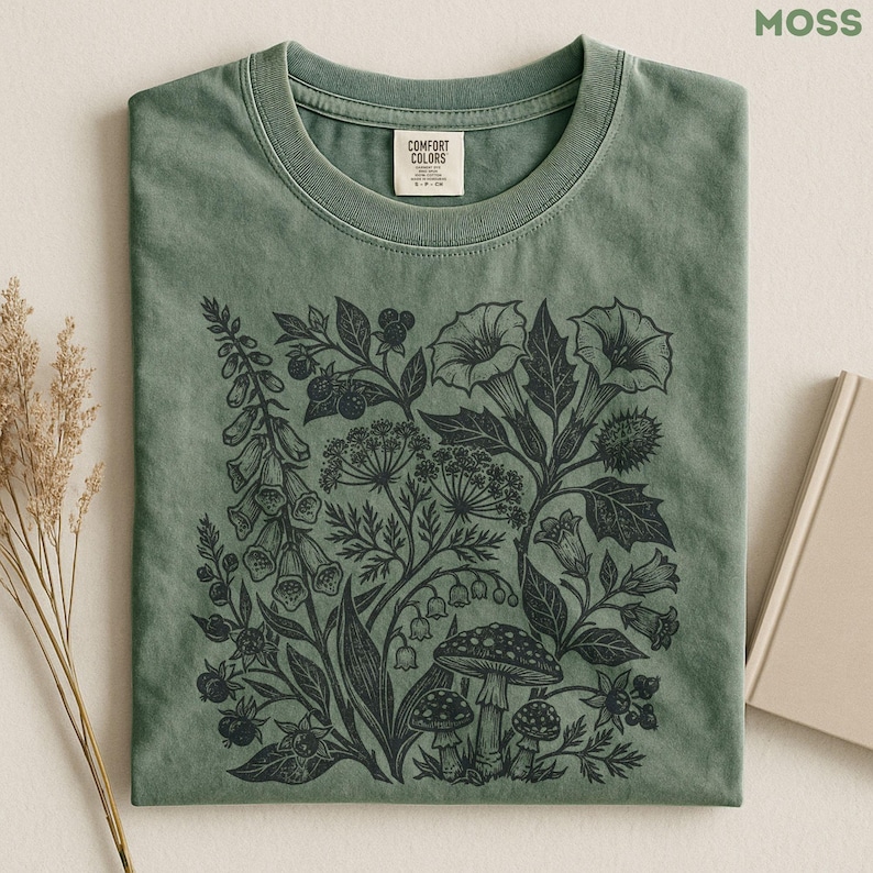 Perfect for botanical goth lovers, dark academia fans, herbalists, gardeners, nature enthusiasts, and anyone fascinated by poisonous plants. Featuring vintage botanical illustrations, this shirt is ideal for witchy wardrobes, cottagecore outfits, plant lovers, mushroom enthusiasts, and unique nature-inspired gifts.