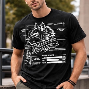 May include: Black t-shirt with a white graphic of a wolf's head and technical diagrams. The shirt includes text such as "MUZZLE ANGLE", "CORE STATS", and "SPECIES: CANIS LUPUS ANTHRO".