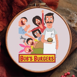 May include: Cross-stitch embroidery of the Bob's Burgers family in a wooden hoop. The characters are depicted in a pixelated style, with Bob holding a burger. The text "Bob's Burgers" is displayed in a yellow and red rectangle.