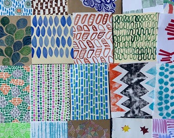 May include: A collection of colorful abstract art pieces. Each piece features unique patterns and designs, including dots, lines, and organic shapes. The color palette includes blues, greens, browns, and reds, creating a vibrant and diverse display of artistic expression.