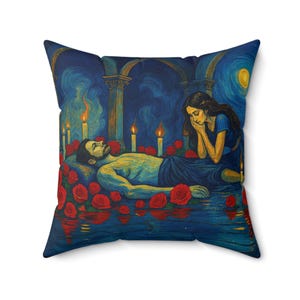 May include: Square throw pillow with a painting of a man lying among red roses, with a woman in blue beside him. The background is a dark blue with candles and arches. The style is reminiscent of Van Gogh.