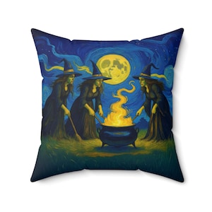 May include: Square throw pillow featuring a painting of three witches gathered around a cauldron with a large yellow moon in the background. The witches wear black dresses and hats, stirring a fire. The night sky is a deep blue with swirling brushstrokes.