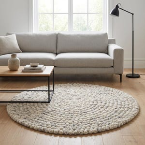 Cozy chunky wool round rug with natural wool texture, minimalist Scandinavian rug for nursery, bedroom, or living room