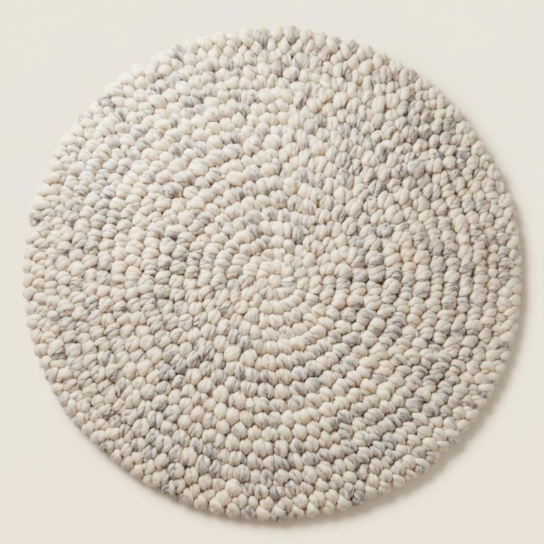Round chunky wool pebble rug handmade from thick wool yarn, soft neutral area rug perfect for minimalist, Scandinavian, or Japandi home decor
