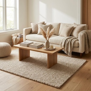 Thick wool rug with nubby texture perfect for neutral home decor and cozy living room styling