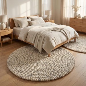 Thick handmade wool area rug with chunky loop texture, Scandinavian neutral round rug for minimalist interior styling