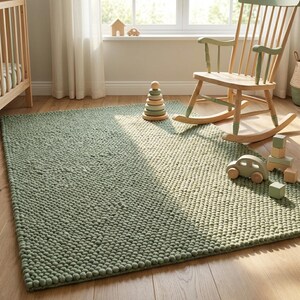 Minimalist chunky wool rug with braided knit design, sustainable wool home decor for Scandinavian interiors