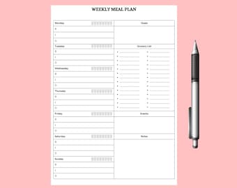 May include: A white weekly meal plan sheet with sections for each day of the week, including space for breakfast, lunch, and dinner. A silver pen with a black grip rests on a pink background.