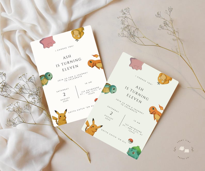 May include: Two invitation cards with a light green background and cartoon characters. The text on the cards reads "Ash is turning eleven" with event details. The cards are decorated with various Pok&eacute;mon characters and a Pok&eacute;ball.