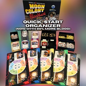 May include: A board game box titled "Moon Colony Bloodbath" with a quick-start organizer. The box is black with yellow and red text. The organizer includes cards and game pieces. The game features a skull graphic and the text "Build, Restock, Farm, Research".