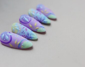 Juego de uñas postizas coloridas