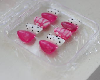 Bonito juego de uñas en color rosa