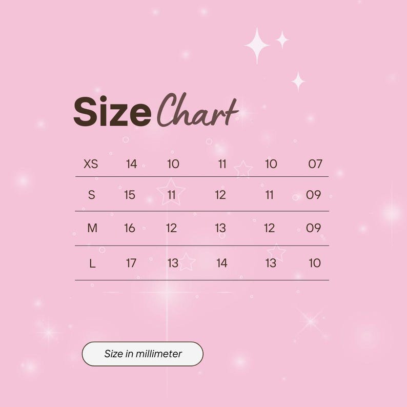 May include: A pink size chart with the text "Size Chart" in a dark brown font. The chart lists sizes XS, S, M, and L with corresponding numerical values. The bottom of the chart reads "Size in millimeter."