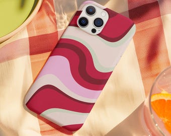 Funda para iPhone estilo años 70 – Compatible con MagSafe, diseño retro rosa y rojo.