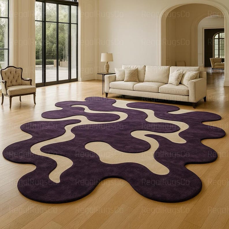 Modern Purple Abstract Wavy Rug in deep plum and beige tones, featuring curved organic shapes. Large 12x15ft contemporary area carpet perfect for living rooms or bedrooms, adding artistic style, warmth, and sophistication to any modern home interior.