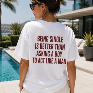 Being Single Is Better Than Asking A Boy To Act Like A Man Shirt, Funny Sarcastic Dating Tee, Bold Red Text Statement Shirt, Empowering Gift