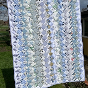Hand crafted patchwork cot quilt