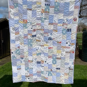 Sustainable patchwork baby cot quilt