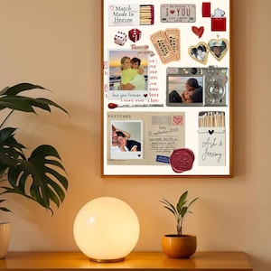 May include: A framed collage print featuring a matchbox labeled Match Made in Heaven, a license plate, a red lighter, dice, cinema tickets, a heart-shaped locket, a digital camera, a postcard with handwritten text, and a matchbox labeled Ash & Jeremy.