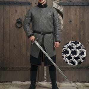 May include: A medieval chainmail shirt with long sleeves and a high collar, worn with a black belt and boots. The shirt is paired with a long sword. The image includes a close-up of the chainmail texture.