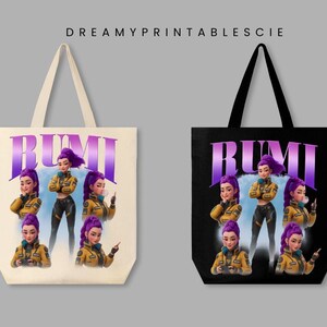 May include: Two tote bags, one cream and one black, each featuring a design with the name "RUMI" in purple letters. The design includes a cartoon illustration of a woman with purple hair in a yellow jacket.