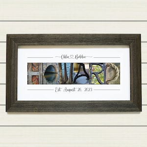 May include: A framed print with a personalized message that reads "Chloe & Bobbie Est. August 26, 2023". The message is surrounded by a collage of images that spell out the word "Home".