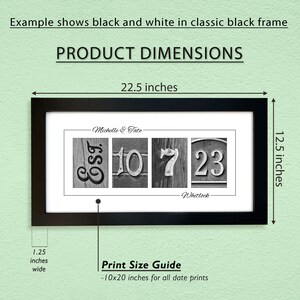 May include: Black and white framed print with the text "Michelle & Tate" and the numbers "EST 10 7 23" and the text "Whitlock". The print is 10 inches by 20 inches and is framed in a black frame. The overall dimensions of the framed print are 22.5 inches wide by 12.5 inches high.