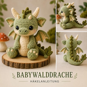May include: A crocheted green dragon with cream-colored accents, including horns, wings, and belly. The dragon has large black eyes and is sitting on a wooden slice. The image includes the text "BABYWALDDRACHE HÄKELANLEITUNG".