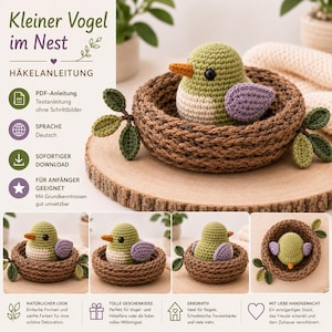 May include: A crocheted bird in a nest, with a green body, purple wing, and orange beak. The bird sits in a brown nest with green leaves. The image includes the text "Kleiner Vogel im Nest" and "HÄKELANLEITUNG".