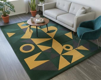 May include: A geometric patterned area rug in shades of green, yellow, and gray. The rug features a repeating design of triangles, circles, and other shapes. The rug is placed in a living room setting with a sofa and chair.