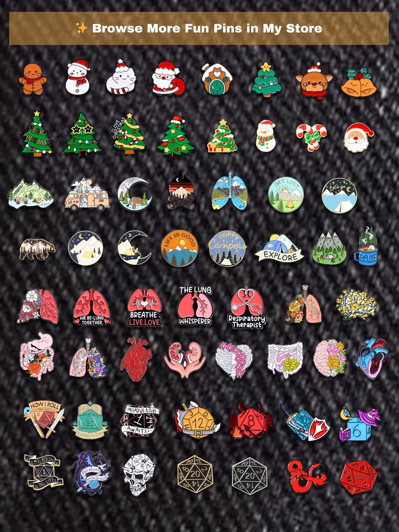 May include: A selection of enamel pins with diverse designs, such as Christmas motifs, camping scenes, anatomical lungs, and dice. The pins are brightly coloured and feature text like "Explore" and "How I Roll."