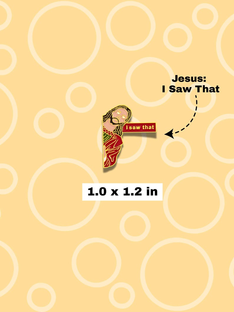 May include: A pin featuring a cartoon depiction of Jesus with the text "I saw that" on a red banner. The pin measures 2.5 x 3.0 cm. The background is a light yellow color with white circles.