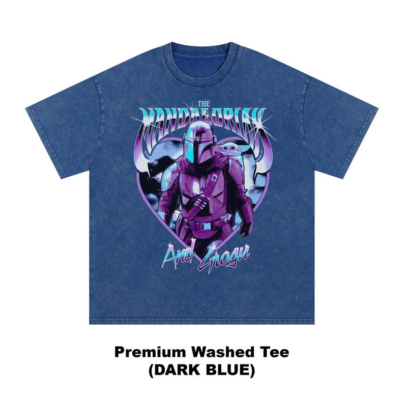 May include: Dark blue premium washed tee featuring a graphic of The Mandalorian and Grogu. The design includes the text "The Mandalorian" in a stylized font, with the characters in the center. The shirt is labeled "Premium Washed Tee (DARK BLUE)".