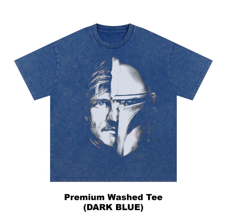 May include: Dark blue premium washed tee featuring a split face design. One side depicts a man's face, the other a Mandalorian helmet. The text at the bottom reads "Premium Washed Tee (DARK BLUE)".