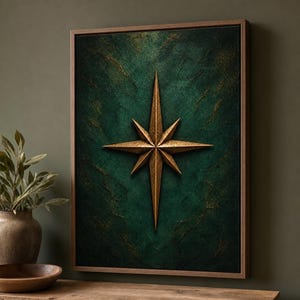 May include: A rectangular wall art piece featuring a central eight-pointed gold star set against a deep, textured forest green background with subtle gold veining. The artwork is encased in a thin, dark brown wooden frame with a clean edge.