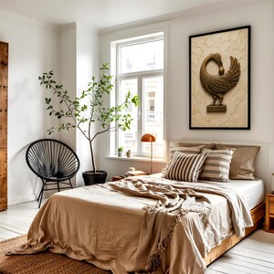 a cozy bedroom with a large bed, a black woven chair, and a potted plant. The room has white walls and a wooden floor, creating a warm and inviting atmosphere.