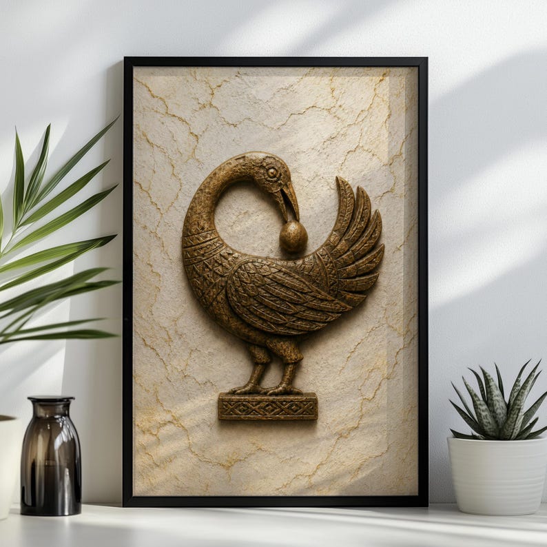 a framed picture of a bird, possibly a goose, with a stone or marble background. The bird is depicted in a detailed and ornate manner, with a beak and a ball in its mouth. The picture is placed on a shelf, with a potted plant to the left and a small white vase to the right.