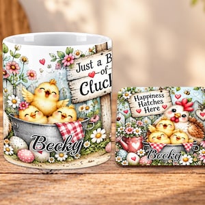 May include: A white ceramic mug and a matching square coaster featuring a colourful illustration of three yellow chicks in a metal tub, a hen, flowers, and Easter eggs. The mug displays the text Just a Bunch of Cluck and Becky, while the coaster says Happiness Hatches Here and Becky.