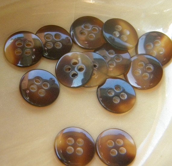 12 Brown plastic buttons. 4 hole design. Buttons for sewing or crafting.