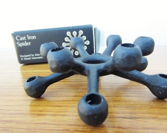 Dansk spider cast iron candleholder. Comes with original box! Atomic cake topper candle holder.