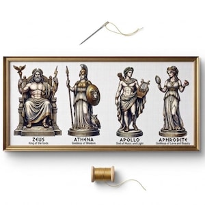 May include: A rectangular framed cross-stitch pattern featuring four Greek deities: Zeus, Athena, Apollo, and Aphrodite. Each figure is labeled with their name and title. A sewing needle with gold thread sits above the frame, and a spool of gold thread sits below.