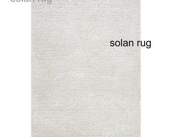 Alfombra texturizada color marfil hecha a mano - Moderna y minimalista alfombra de lana gris y crema - Suave y neutra alfombra de pelo largo para sala de estar y dormitorio - Estilo Antanė