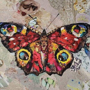May include: A colorful collage of paper scraps depicting a large red, yellow, and blue butterfly with intricate details. The butterfly is surrounded by a variety of floral and geometric patterns.